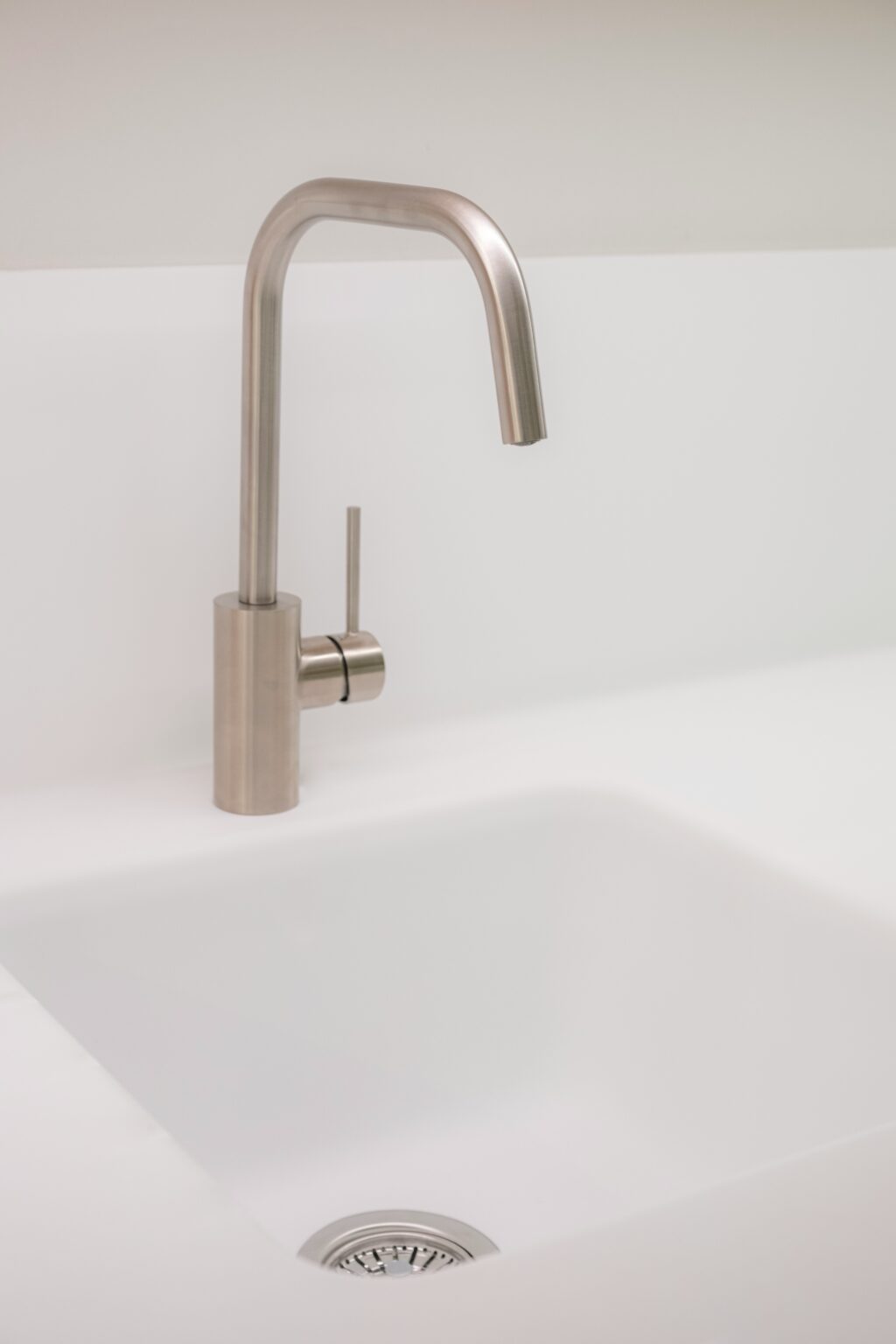 Bros. Built how to choose the right tapware for your bathroom renovation. Chrome tap with white ceramic sink from Woonoona bathroom renovation 